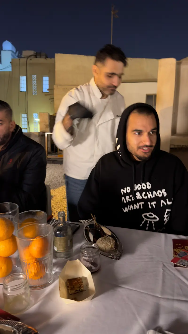 Rooftop courtyard supper scene